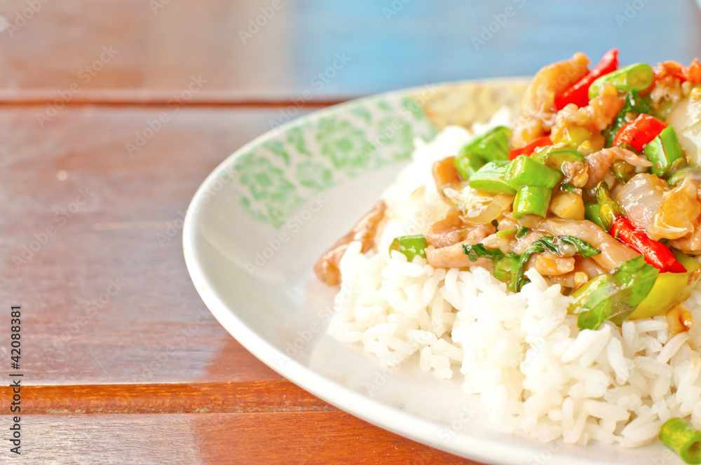 Thai spicy food, stir fried chicken whit basil on rice Thai spicy food, stir fried chicken whit basil on rice