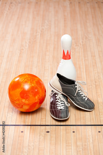 Bowling pins, balls and shoes