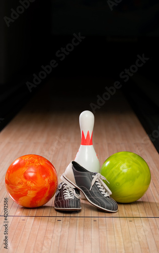Bowling pins, balls and shoes