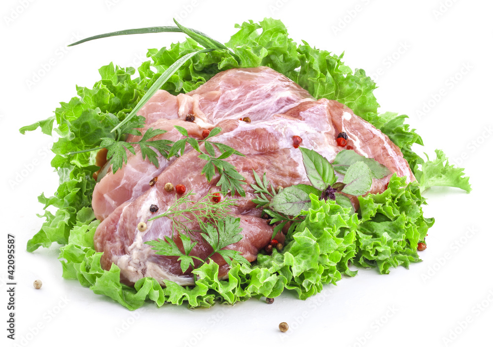 Raw meat, fresh lettuce, herbs and spices isolated on white Raw meat, fresh lettuce, herbs and spices isolated on white