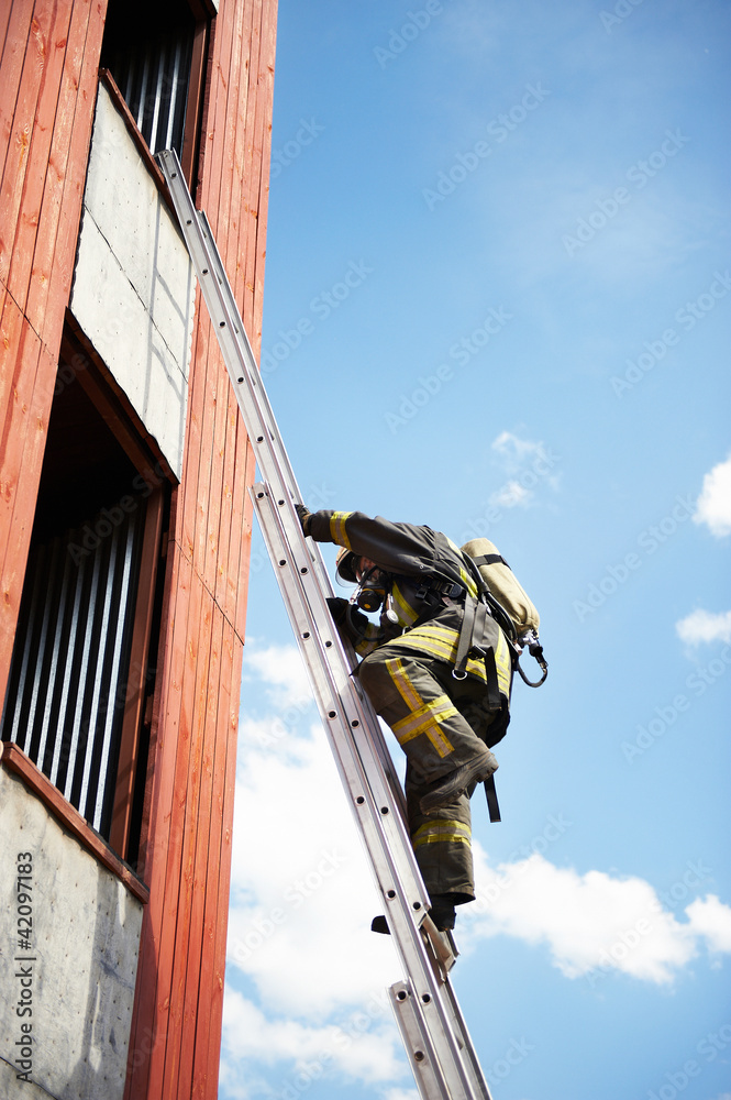 Firefighter climb on fire stairs Firefighter climb on fire stairs