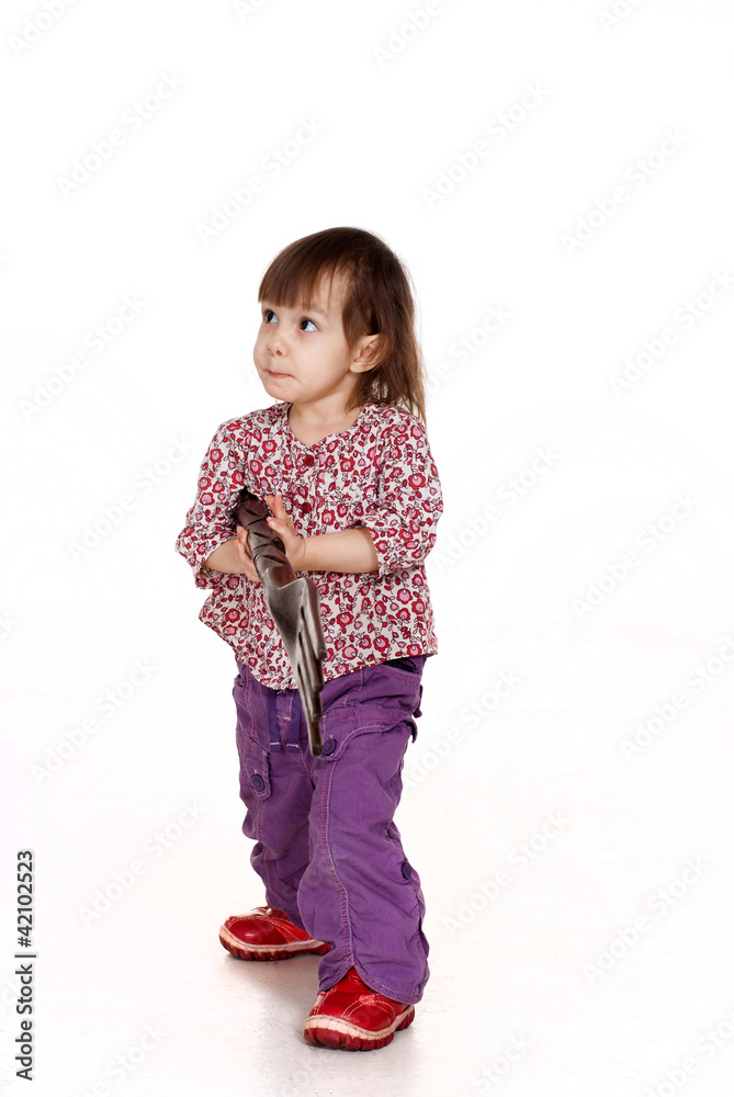 Beautiful little Caucasian girl posing with a fork Beautiful little Caucasian girl posing with a fork