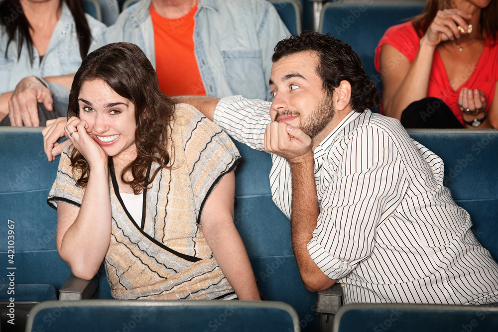 Obraz premium Embarrassed Girl in Theater