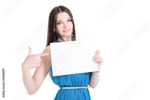 Girl holding a sheet of paper with text space