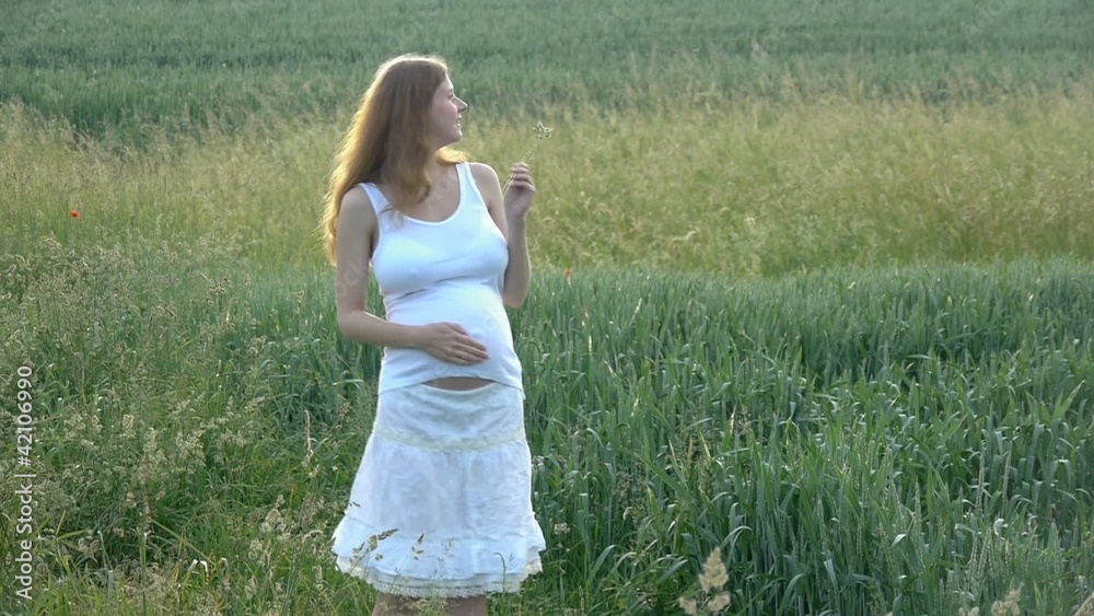7 months pregnant woman outdoor in nature have fun 7 months pregnant woman outdoor in nature have fun