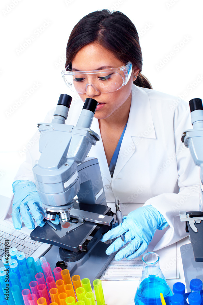 Scientific woman working in laboratory. Scientific woman working in laboratory.