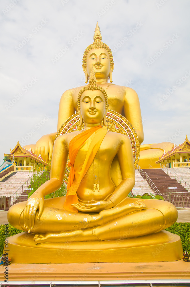 Golden Buddha statue at Wat Muang temple in Angthong, Thailand Golden Buddha statue at Wat Muang temple in Angthong, Thailand
