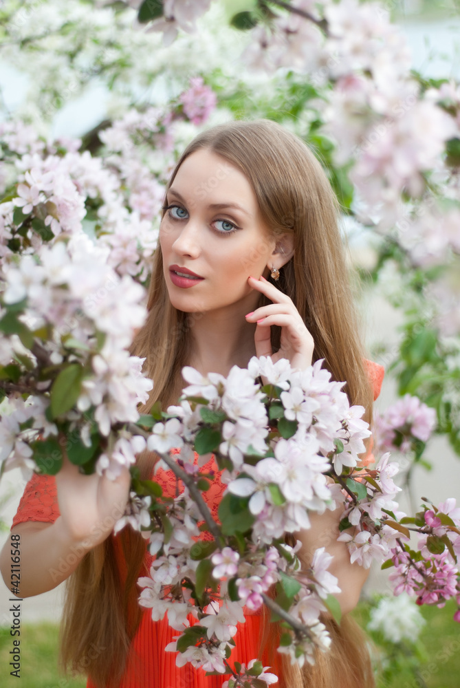 Girl in spring flowers