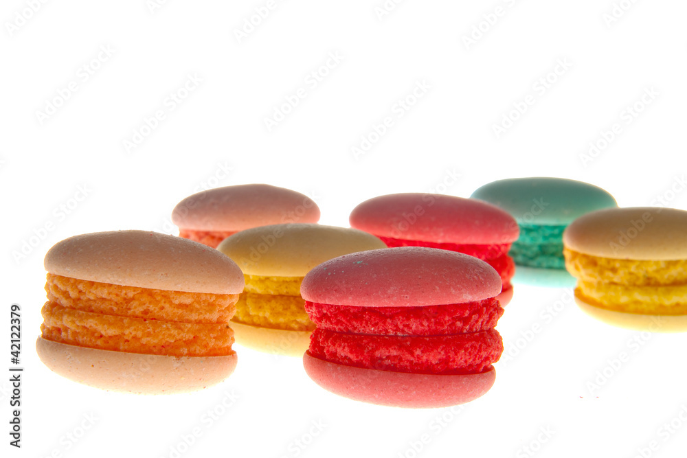 Fototapeta premium a lot of colorful macaroons on a white background