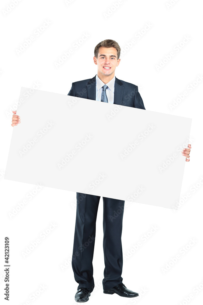 Happy smiling young business man showing blank Happy smiling young business man showing blank