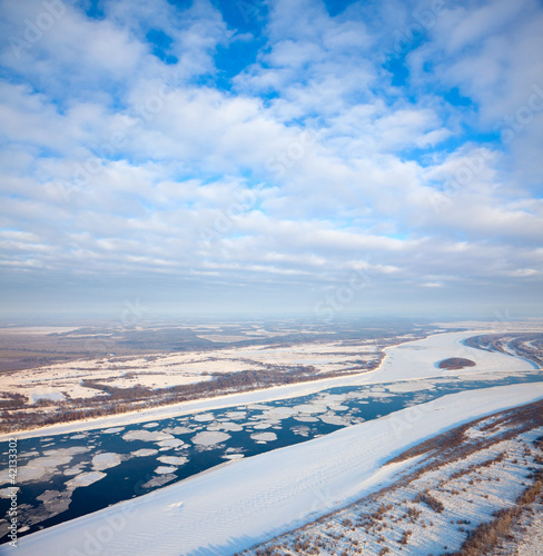 Spring of drifting of ice on the great river