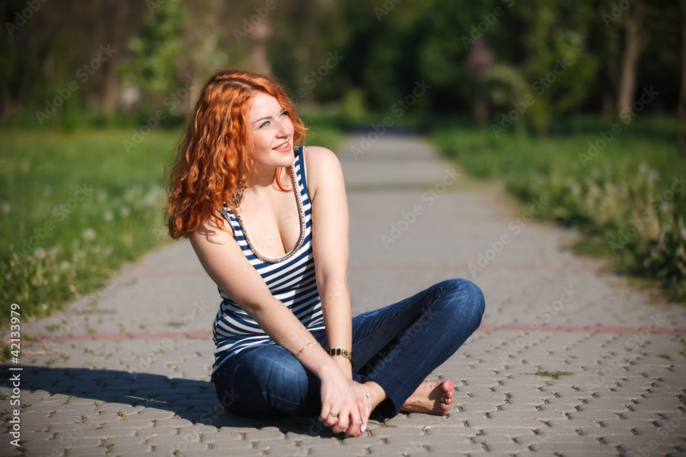beautiful happy young woman in the park