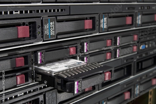 Plakat server with open disk enclosure