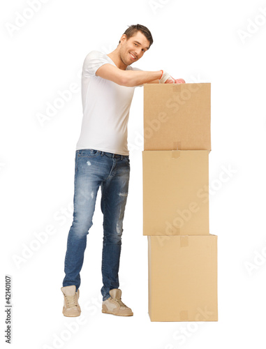 handsome man with big boxes