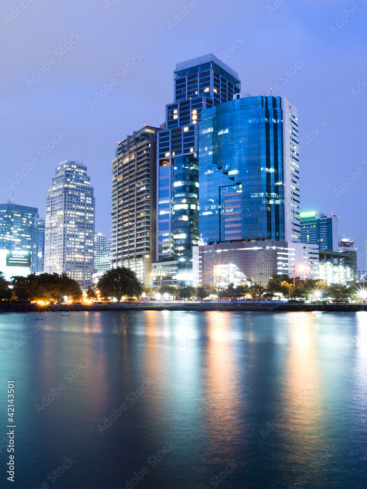 Bangkok city downtown at night with reflection of skyline, Bangk