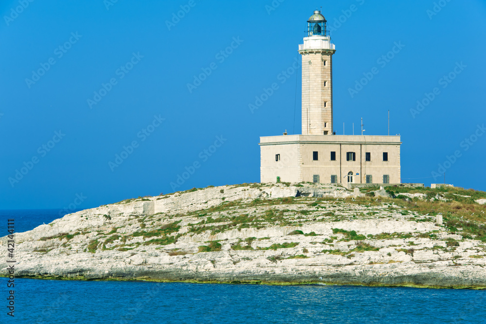 lighthouse on a small rock island
