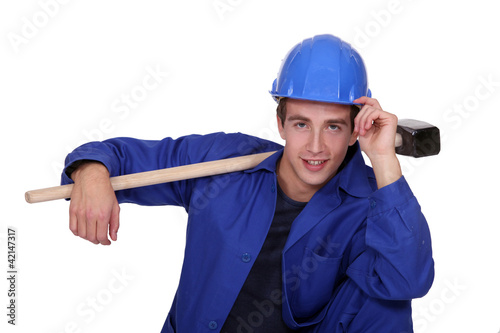 Man posing with sledge-hammer