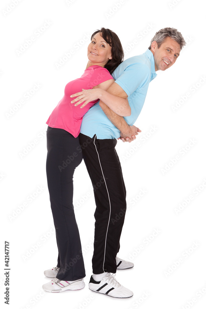Active mature couple doing fitness Active mature couple doing fitness