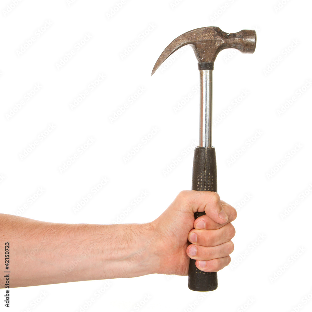 Man holding a old metal hammer Man holding a old metal hammer