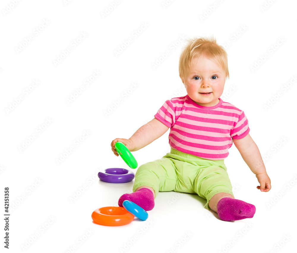 Infant playing and learning isolated on white Infant playing and learning isolated on white