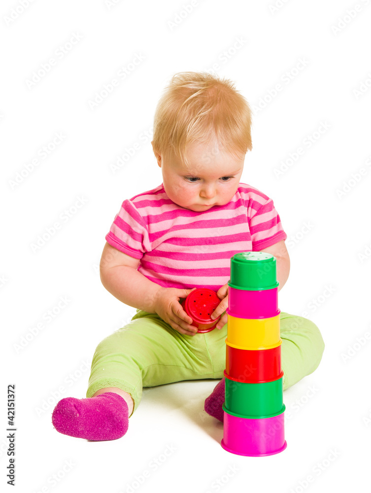 Infant playing and learning isolated on white Infant playing and learning isolated on white