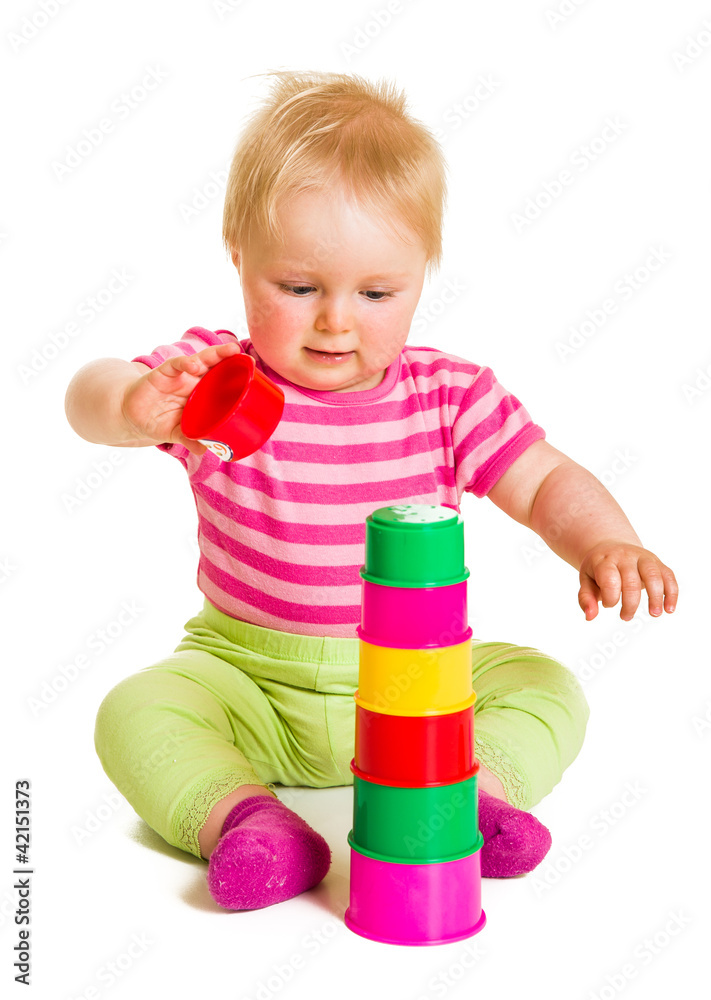 Infant playing and learning isolated on white Infant playing and learning isolated on white