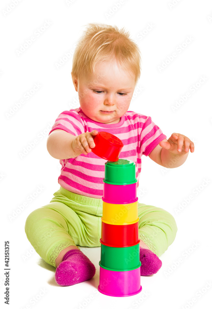 Infant playing and learning isolated on white Infant playing and learning isolated on white
