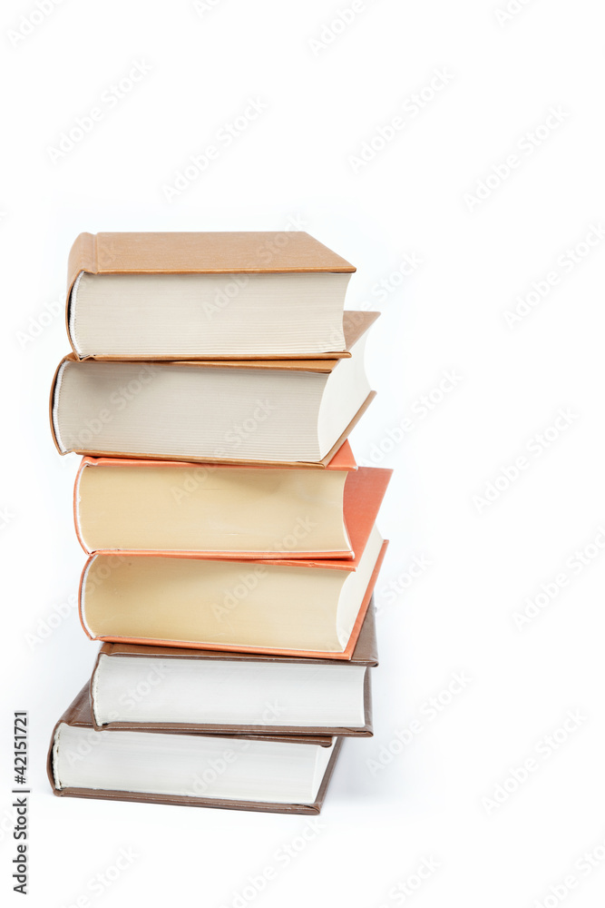 A stack of books on a white background. A stack of books on a white background.