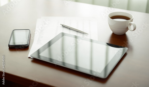 Modern workplace with digital tablet