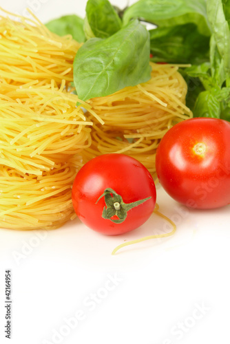 spaghetti, basil and tomatoes