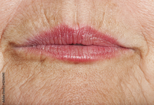 wrinkled woman skin with lips