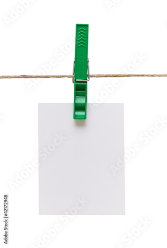 clothes peg and note paper on clothes line rope