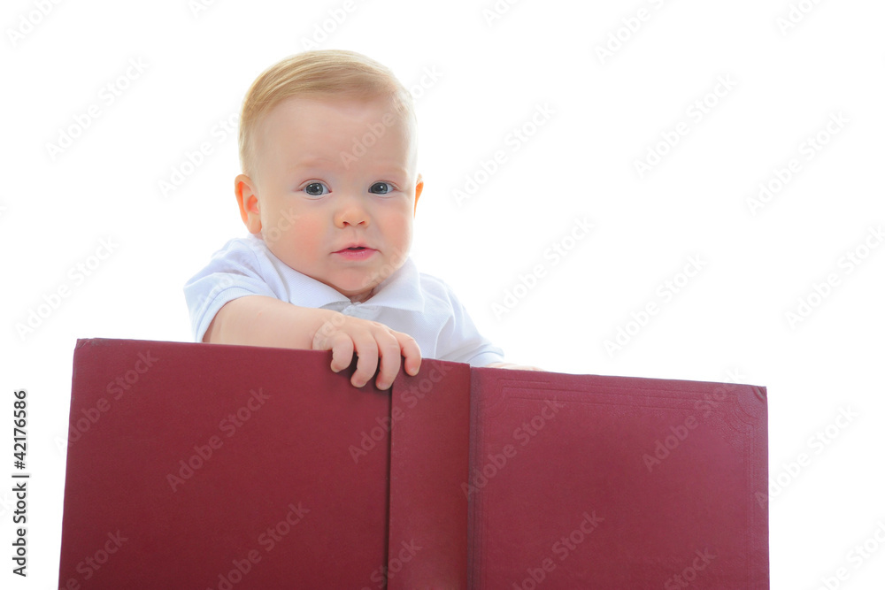 Little boy reads a big book Little boy reads a big book