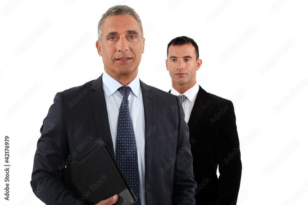 Businessman with his assistant Businessman with his assistant