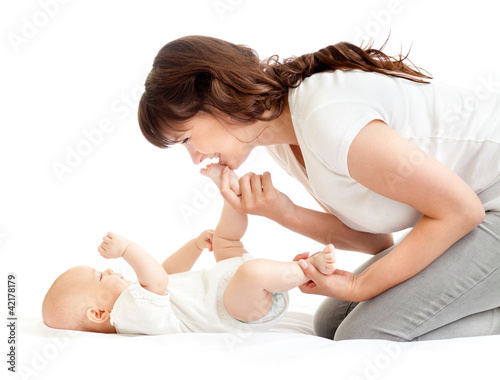 joyful mother playing with ...
