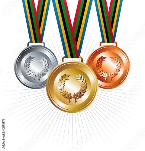 Gold, silver and bronze medals with ribbons background