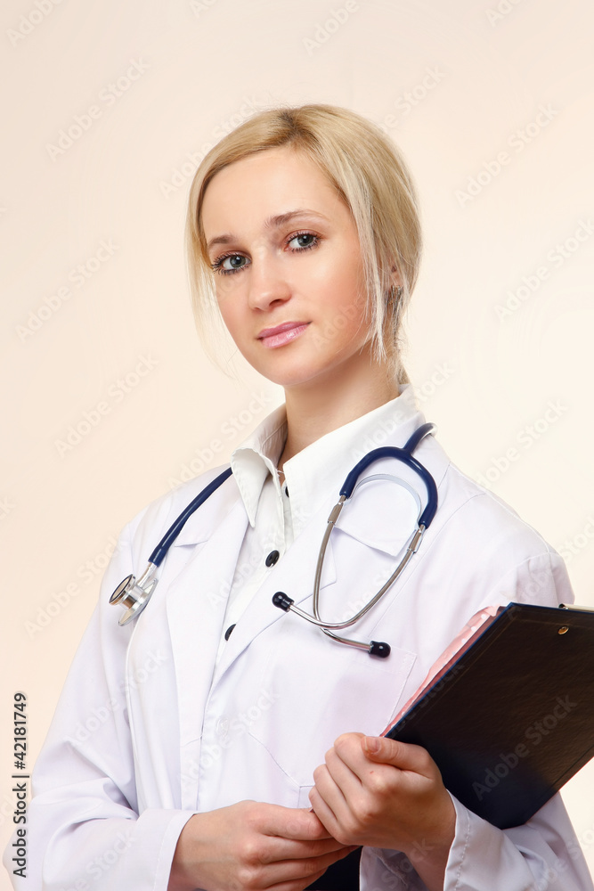 A female doctor with a folder , isolated on white background A female doctor with a folder , isolated on white background
