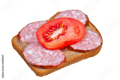 sandwich with sausage and cucumbers
