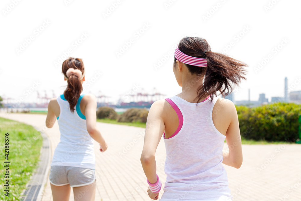 Beautiful young women running. Portrait of asian.