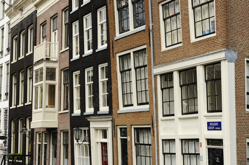 Photography old  leaning facades, amsterdam