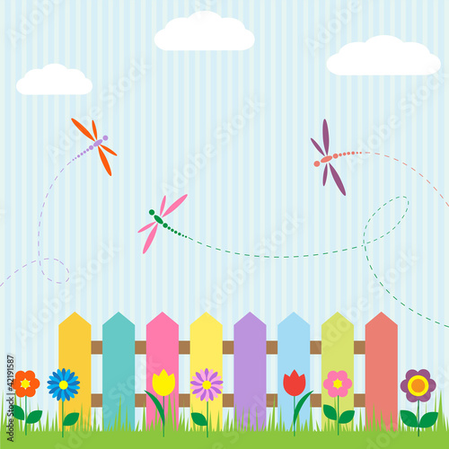 Colorful fence with flowers and dragonflies