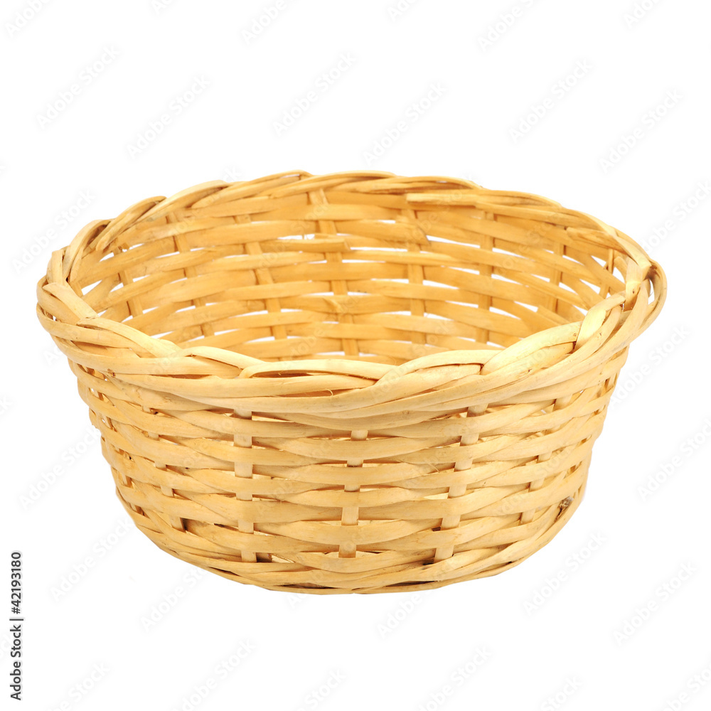 Round woven straw basket isolated on the white Round woven straw basket isolated on the white
