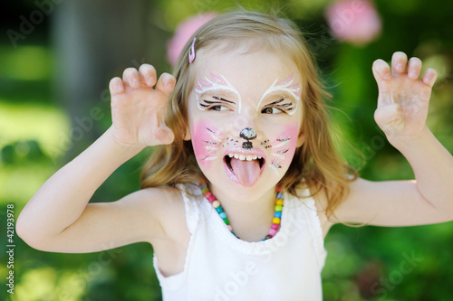 Fotografie Adorable little girl with her face painted