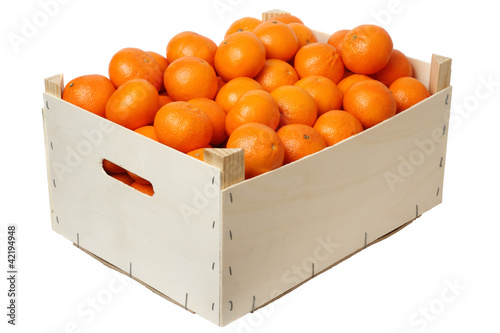 Plywood box full of mandarins