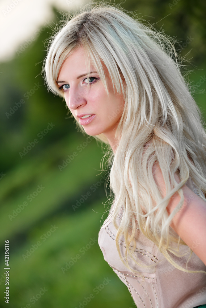 Portrait of a pretty woman in the field Portrait of a pretty woman in the field