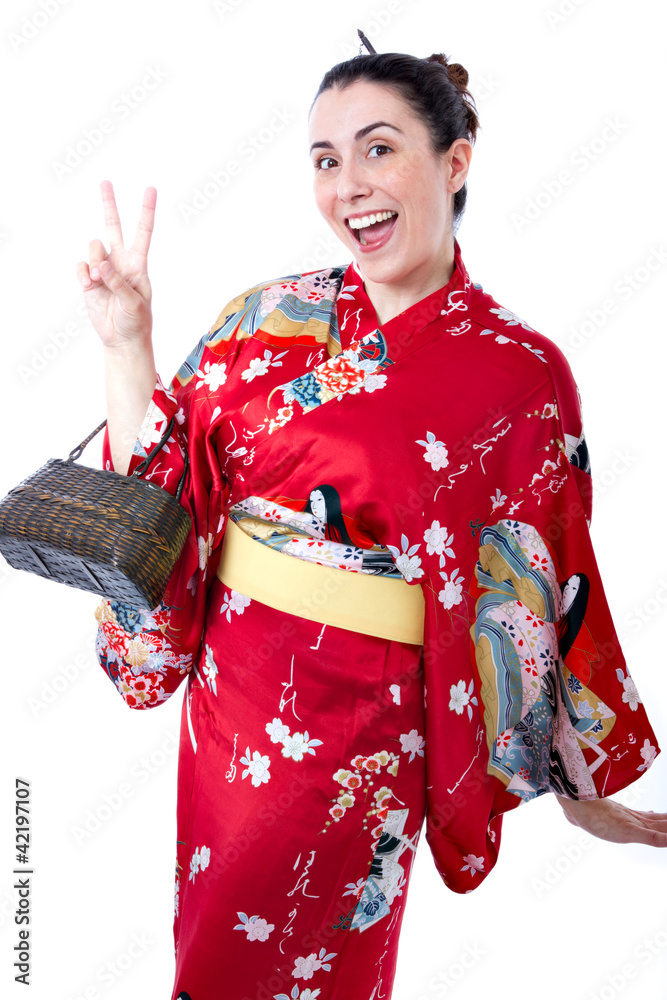 tourist dressed with a kimono victory gesture tourist dressed with a kimono victory gesture
