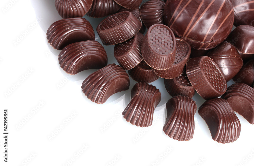 Many different chocolate candy isolated on white