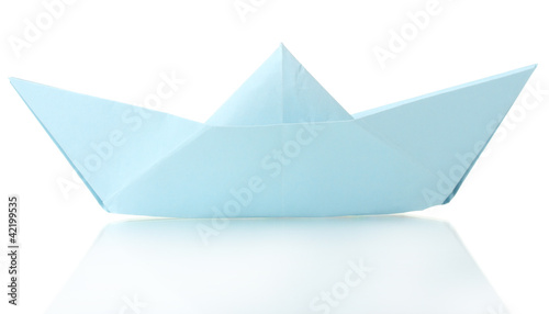 Origami boat out of the blue paper isolated on white