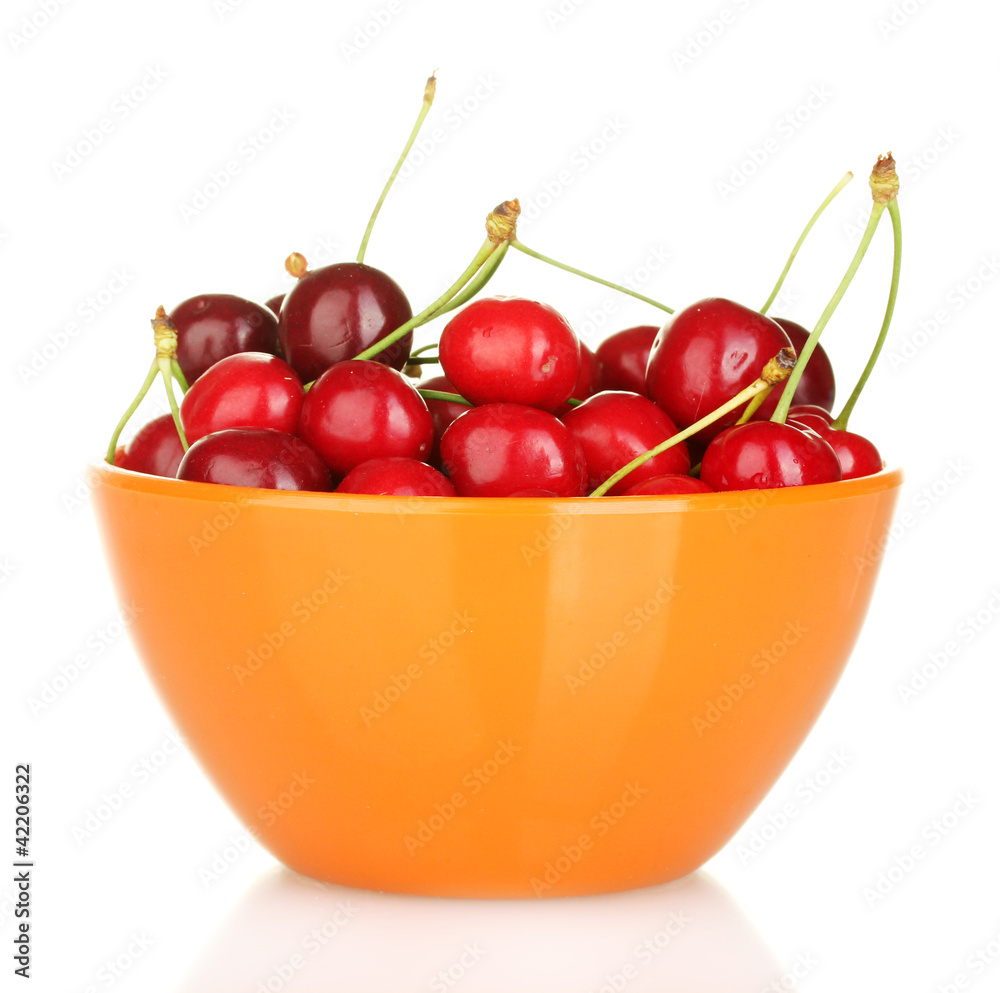 cherry in a orange bowl isolated on white cherry in a orange bowl isolated on white