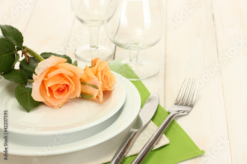 beautiful holiday table setting with flowers